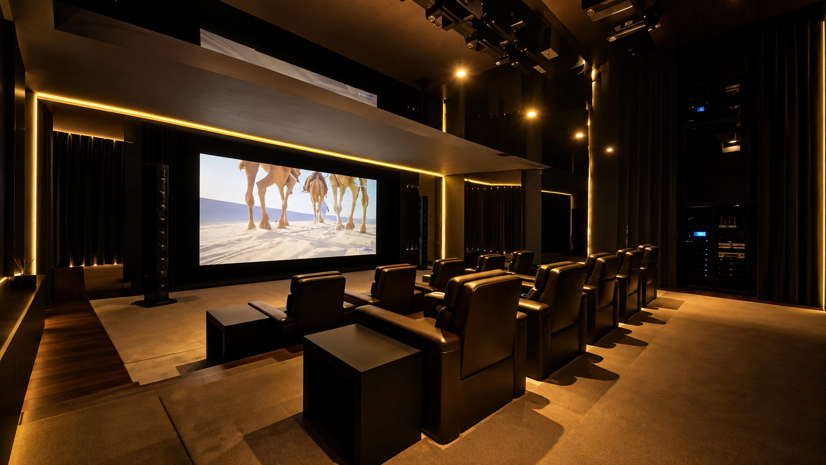 HAP custom home theatre with warm amber architectural lighting and cinema seating
