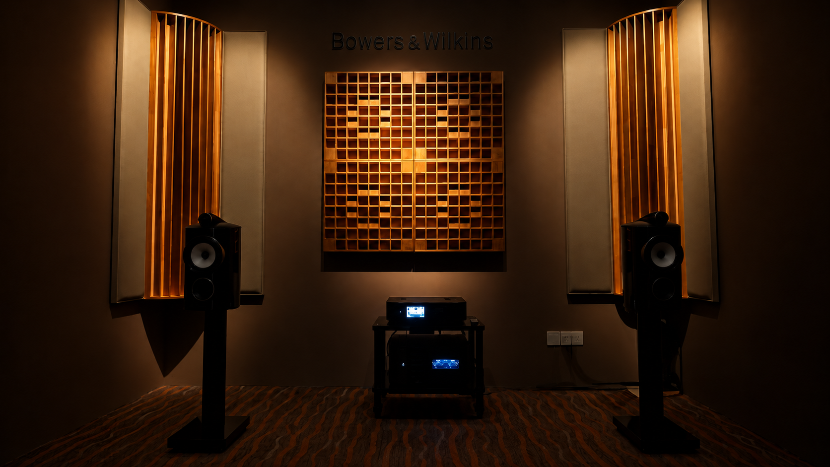 HAP Singapore Hi-Fi showroom with Bowers & Wilkins speakers and an illuminated acoustic treatment wall