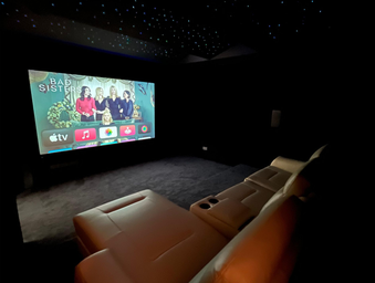 Dedicated movie theater room by HAP